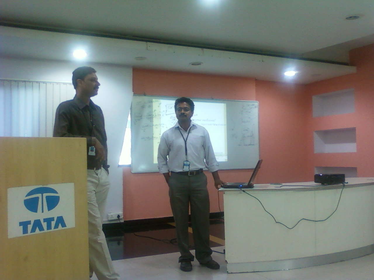 Dr. Suresh Kumar at the TATA podium delivering a corporate health session